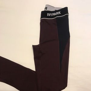 Ivy Park workout leggings. Size M Black & Burgundy